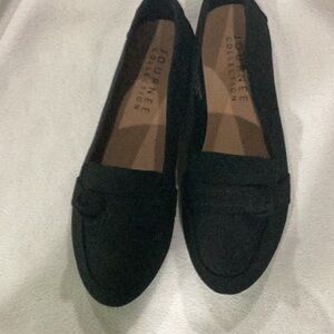 Black suede flat shoes